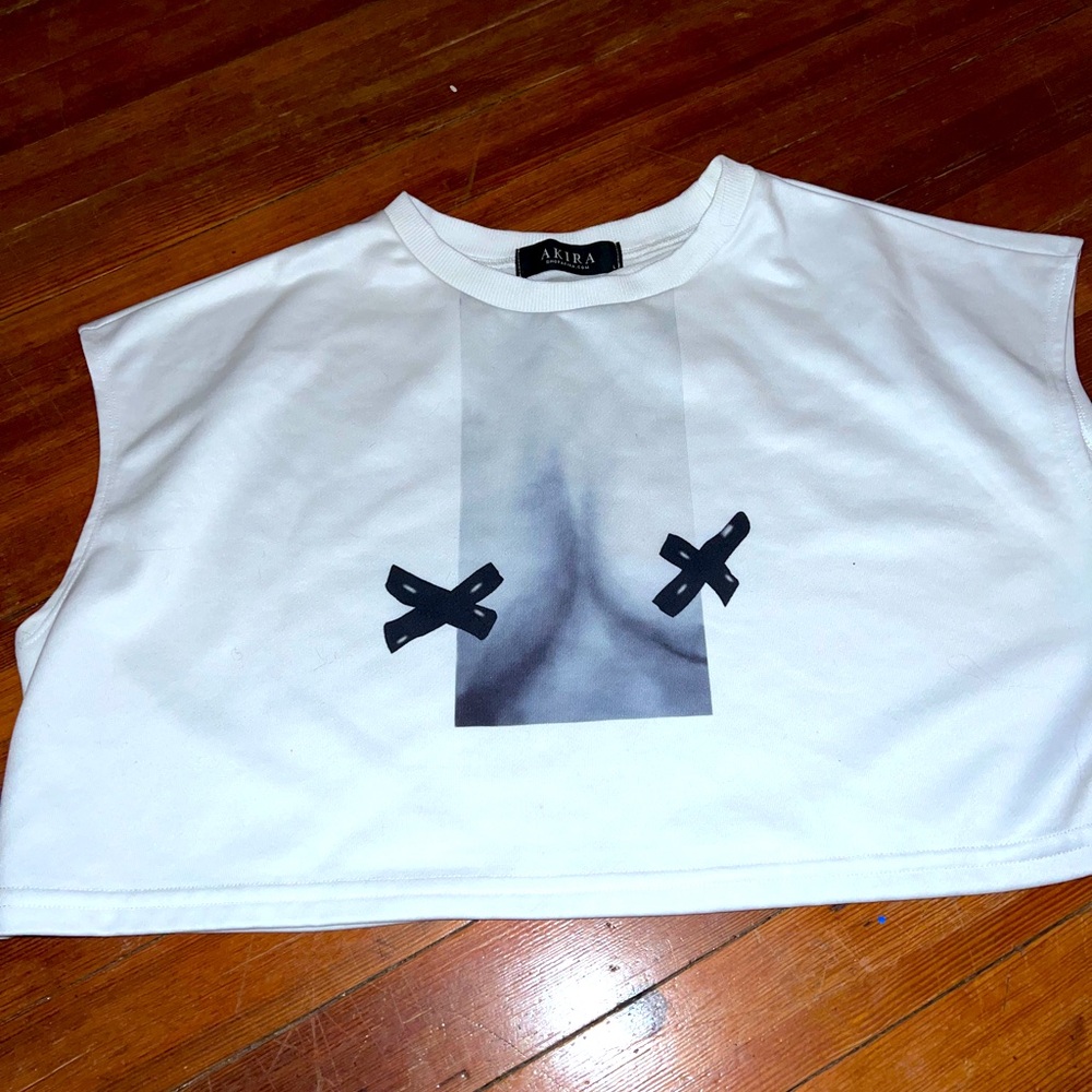 Akira, white sleeveless shirt with faux cleavage